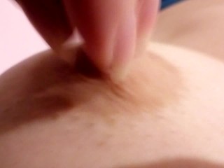 Teasing a perfectly hard nipple